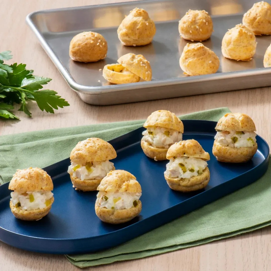 https://d3xhk4vytuuf2.cloudfront.net/Chicken-Salad-Puffs.webp