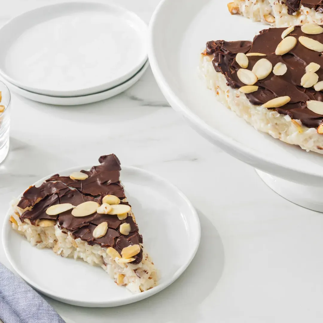https://d3xhk4vytuuf2.cloudfront.net/Almond-Joy-Rice-Torte-Recipe.webp