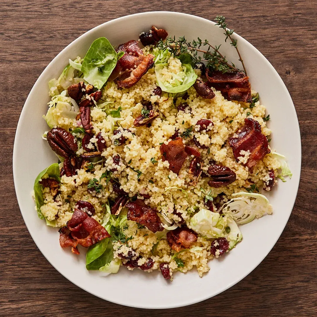 https://d3xhk4vytuuf2.cloudfront.net/Holiday-Couscous-Salad-Recipe.webp