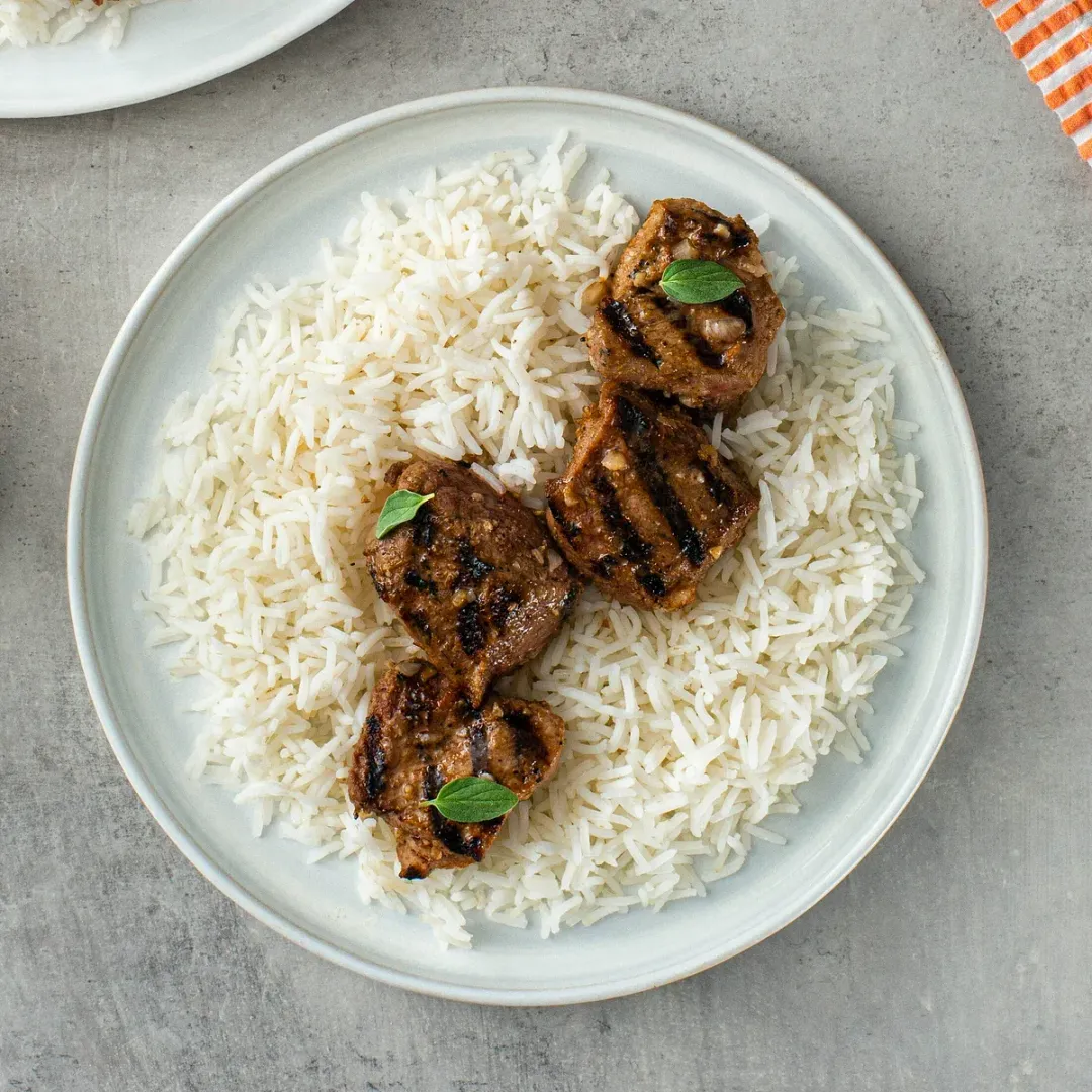 https://d3xhk4vytuuf2.cloudfront.net/Lamb-Shish-Kebab-and-Rice.webp