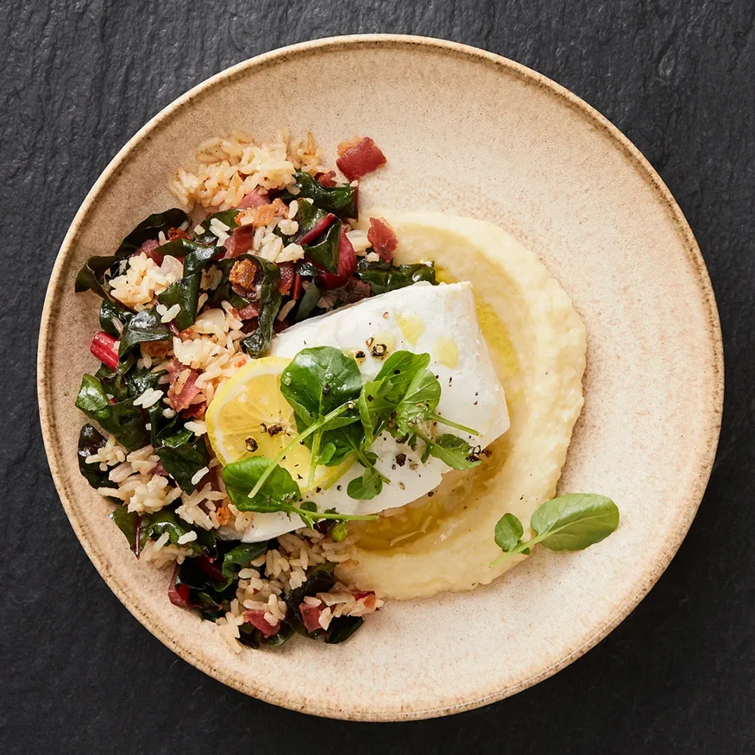 https://d3xhk4vytuuf2.cloudfront.net/Wine-Poached-Halibut-with-Celery-Root-Puree-Recipe.webp